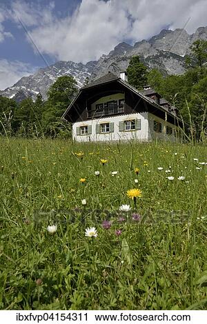 Farmhouse in front of the east wall of the Watzmann, St. Bartholoma, Upper Bavaria, Bavaria, Germany, Europe View Large Photo Image Stock Image - Farmhouse in front of the east wall of the Watzmann, St. Bartholoma, Upper Bavaria, Bavaria, Germany, Europe. Fotosearch
