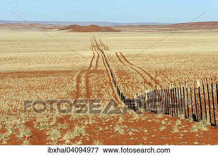 Fence, steppe landscape south of the Namib Desert, Namibia, Africa View Large Photo Image Stock Photo - Fence, steppe landscape south of the Namib Desert, Namibia, Africa. Fotosearch