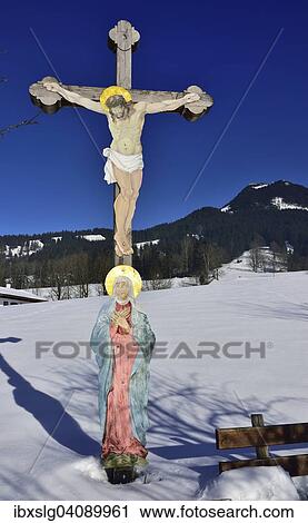 Field cross, crucifix with Maria, colored sheet metal, behind Breitenstein in Fischbachau, Leitzachtal, foothills of the Alps, Bavaria, Germany, Europe View Large Photo Image Stock Image - Field cross, crucifix with Maria, colored sheet metal, behind Breitenstein in Fischbachau, Leitzachtal, foothills of the Alps, Bavaria, Germany, Europe. Fotosearch