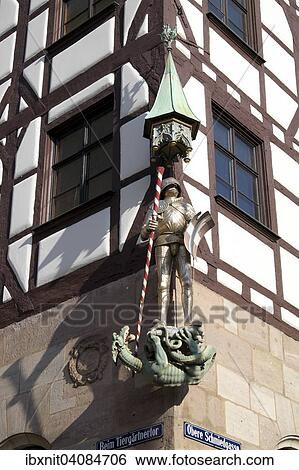 Figure of a knight on the facade of a half-timbered house, Beim Tiergartnertor street, Nuremberg, Middle Franconia, Franconia, Bavaria, Germany, Europe View Large Photo Image Stock Photograph - Figure of a knight on the facade of a half-timbered house, Beim Tiergartnertor street, Nuremberg, Middle Franconia, Franconia, Bavaria, Germany, Europe. Fotosearch