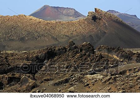 Stock Image - Fire mountains, volcanic landscape in the Timanfaya National Park Montana del Fuego, Lanzarote, Canary Islands, Canary Islands, Spain, Europe. Fotosearch
