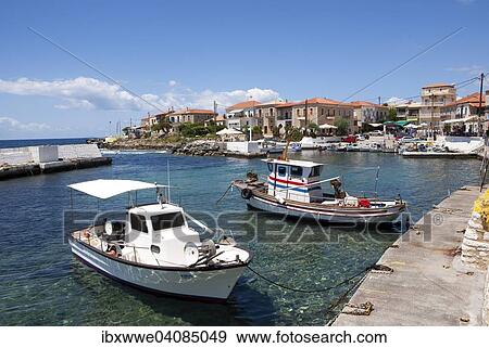 Fishing boats in the harbour, Agios Nikolaos, Mani Peninsula, Peloponnese, Greece, Europe View Large Photo Image Stock Photo - Fishing boats in the harbour, Agios Nikolaos, Mani Peninsula, Peloponnese, Greece, Europe. Fotosearch