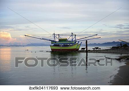 Stock Image - Fishing boats near the village of Lam Rukam, Subdistrict Rozma, Aceh, Sumatra, Indonesia, Asia. Fotosearch