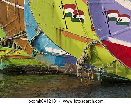 Stock Photo - Fishing boats with Indian flag, Gundu Island, Kerala, India, Asia. Fotosearch