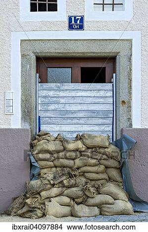 Picture - Flood control measures, sandbags and a protective wall of steel slats in front of a front door, historic centre, Passau, Lower Bavaria, Bavaria, Germany, Europe. Fotosearch