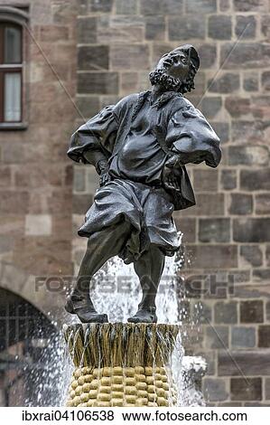 Stock Photo - Fountain statue Hans Sachs, by Jurgen Weber, Weisser Turm, historic centre, Nuremberg, Middle Franconia, Franconia, Bavaria, Germany, Europe. Fotosearch