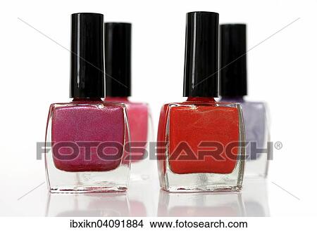 Four nail polish bottles, different colors View Large Photo Image Picture - Four nail polish bottles, different colors. Fotosearch