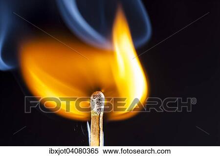Stock Photography - Freshly ignited match, flame at the match head. Fotosearch