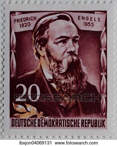 Stock Image - Friedrich Engels, a German social scientist, author, political theorist, philosopher, Marxist theory, portrait on a stamp, GDR, 1955. Fotosearch