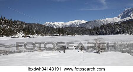 Frozen lake Lautersee in front of Karwendel Mountains, near Mittenwald, Werdenfelser Land, Upper Bavaria, Bavaria, Germany, Europe View Large Photo Image Stock Image - Frozen lake Lautersee in front of Karwendel Mountains, near Mittenwald, Werdenfelser Land, Upper Bavaria, Bavaria, Germany, Europe. Fotosearch