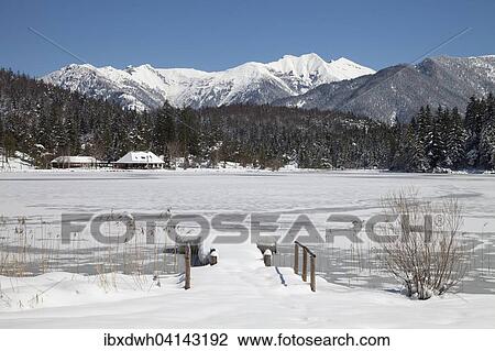 Frozen lake Lautersee in front of Karwendel Mountains, near Mittenwald, Werdenfelser Land, Upper Bavaria, Bavaria, Germany, Europe View Large Photo Image Stock Image - Frozen lake Lautersee in front of Karwendel Mountains, near Mittenwald, Werdenfelser Land, Upper Bavaria, Bavaria, Germany, Europe. Fotosearch