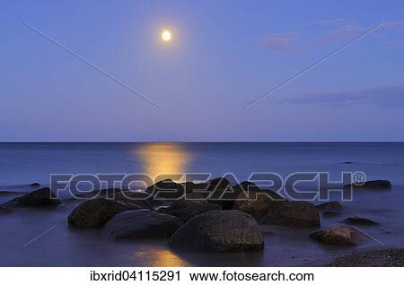 Stock Image - Full moon above the Baltic Sea, Fehmarn, Schleswig-Holstein, Germany, Europe. Fotosearch