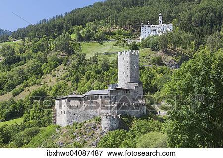 Stock Photo - Furstenburg Castle, 13th century, now a College of Agriculture and Forestry, Marienberg Abbey at the back, near Burgeis, Burgusio, South Tyrol, Trentino-Alto Adige, Italy, Europe. Fotosearch