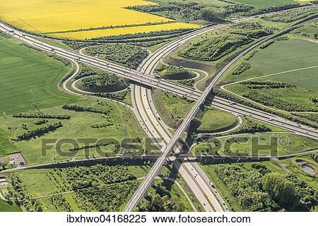 Stock Photography - German federal highways 4 and 71, Erfurter Kreuz interchange, ICE high-speed railway line Berlin-Munich, opened in 2015, part of the transport project Deutsche Einheit, Ichtershausen, Thuringia, Germany, Europe. Fotosearch