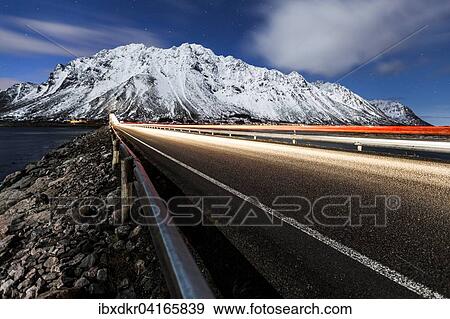 Gimsoystraumen bridge at night with a starry sky, Gimsoy Bridge, Gimsoy, Lofoten, Norway, Europe View Large Photo Image Stock Photo - Gimsoystraumen bridge at night with a starry sky, Gimsoy Bridge, Gimsoy, Lofoten, Norway, Europe. Fotosearch