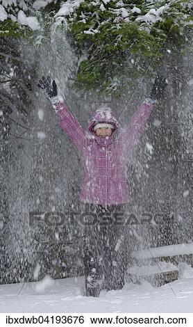 Girl enjoying the snow in winter, Upper Bavaria, Bavaria, Germany, Europe View Large Photo Image Stock Photograph - Girl enjoying the snow in winter, Upper Bavaria, Bavaria, Germany, Europe. Fotosearch