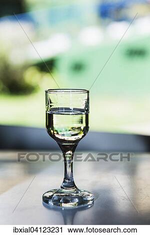 Glass with Brazilian cachaca spirit View Large Photo Image Stock Image - Glass with Brazilian cachaca spirit. Fotosearch