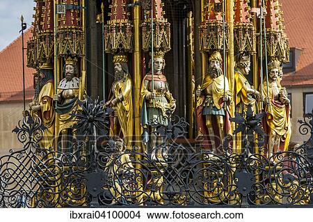 Picture - Gothic figures of Joshua, Judas Maccabaeus, King David, Julius Caesar, Alexander the Great, Hector of Troy, archbishops of Cologne and Mainz, Schoner Brunnen fountain, Nuremberg, Middle Franconia, Franconia, Bavaria, Germany, Europe. Fotosearch
