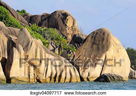 Stock Photo - Granite rocks on Anse Source d'Argent beach, La Digue Island, La Digue and Inner Islands, Seychelles, Africa. Fotosearch