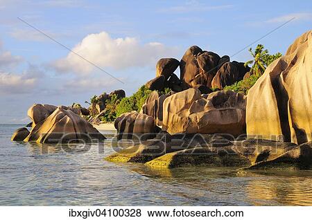 Stock Photo - Granite rocks on the beach Anse Source d'Argent, La Digue, Seychelles, Africa. Fotosearch