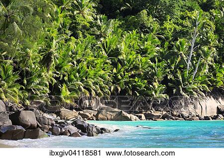 Stock Image - Granite rocks on the beach of Anse Intendance, Mahe Island, Seychelles, Africa. Fotosearch
