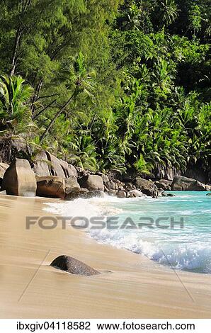 Stock Image - Granite rocks on the beach of Anse Intendance, Mahe Island, Seychelles, Africa. Fotosearch