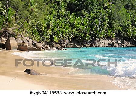 Stock Image - Granite rocks on the beach of Anse Intendance, Mahe Island, Seychelles, Africa. Fotosearch