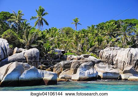Granite rocks, uninhabited island of Ile Cocos, Coco Iceland, Praslin, Seychelles, Africa View Large Photo Image Picture - Granite rocks, uninhabited island of Ile Cocos, Coco Iceland, Praslin, Seychelles, Africa. Fotosearch