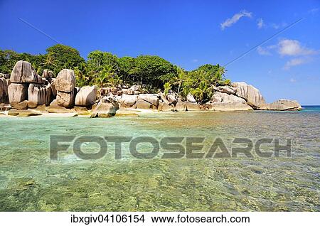 Picture - Granite rocks, uninhabited island of Ile Cocos, Coco Iceland, Praslin, Seychelles, Africa. Fotosearch