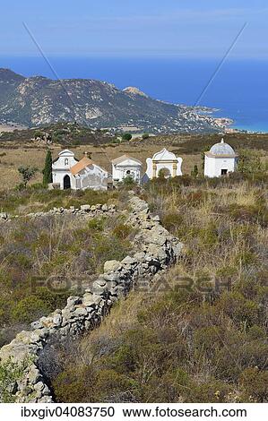 Graves with sea view, near Calvi, Balagne, Haute-Corse, Corsica, France, Europe View Large Photo Image Stock Image - Graves with sea view, near Calvi, Balagne, Haute-Corse, Corsica, France, Europe. Fotosearch