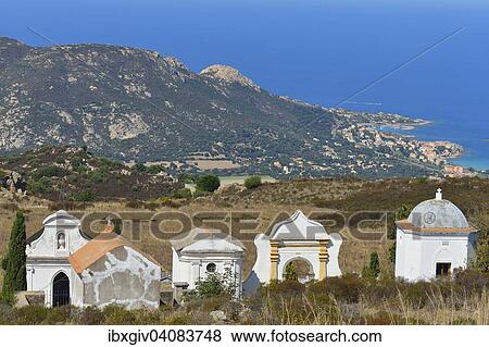 Stock Photo - Graves with sea view, near Calvi, Balagne, Haute-Corse, Corsica, France, Europe. Fotosearch
