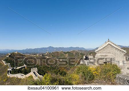 Stock Image - Great Wall of China, historical border fortress, restored section with watchtowers, winding its way over mountain ridge, Jinshanling, China, Asia. Fotosearch