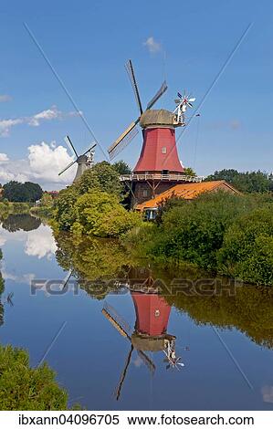 Greetsiel twin windmills, smock mills, Greetsiel, Krummhorn, East Frisia, Lower Saxony, Germany, Europe View Large Photo Image Stock Photography - Greetsiel twin windmills, smock mills, Greetsiel, Krummhorn, East Frisia, Lower Saxony, Germany, Europe. Fotosearch
