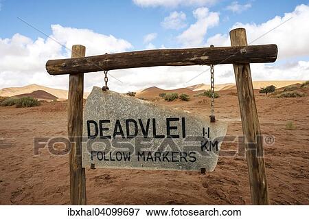 Guidepost to Dead Vlei, sand dunes, Dead Vlei, Sossusv lei, Namib Desert, Namib-Naukluft National Park, Namibia, Africa View Large Photo Image Stock Photo - Guidepost to Dead Vlei, sand dunes, Dead Vlei, Sossusv lei, Namib Desert, Namib-Naukluft National Park, Namibia, Africa. Fotosearch