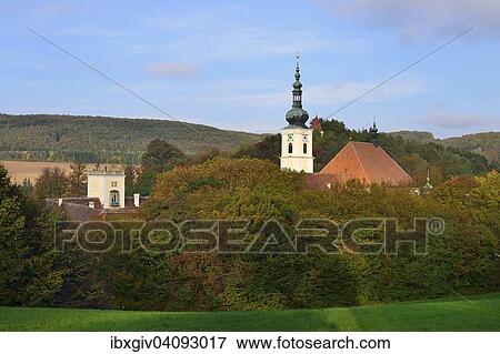 Stock Photo - Heiligenkreuz Abbey, Stift Heiligenkreuz, Cistercian monastery of the collegiate church in autumn, Heiligenkreuz, Lower Austria, Austria, Europe. Fotosearch