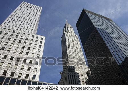 High-rise buildings, skyscrapers, the Chrysler Building in the middle, Manhattan, New York, USA View Large Photo Image Stock Image - High-rise buildings, skyscrapers, the Chrysler Building in the middle, Manhattan, New York, USA. Fotosearch