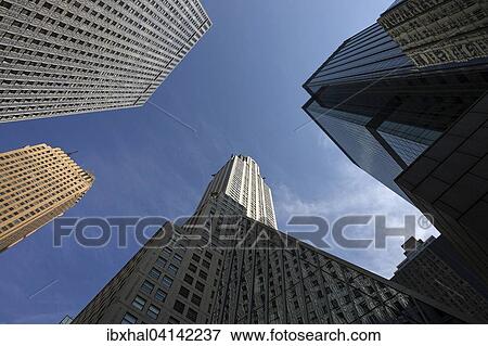 High-rise buildings, skyscrapers, the Chrysler Building in the middle, Manhattan, New York, USA View Large Photo Image Stock Photo - High-rise buildings, skyscrapers, the Chrysler Building in the middle, Manhattan, New York, USA. Fotosearch