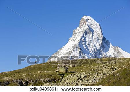 Hiker on the Hohbalmen trail, the Matterhorn at the back, Zermatt, Canton of Valais, Switzerland, Europe View Large Photo Image Stock Image - Hiker on the Hohbalmen trail, the Matterhorn at the back, Zermatt, Canton of Valais, Switzerland, Europe. Fotosearch