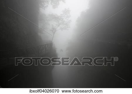 Hiking trail in fog, Tianmen Mountain, Tianmen Mountain National Park, Yongding, Zhangjiajie, China, Asia View Large Photo Image Stock Image - Hiking trail in fog, Tianmen Mountain, Tianmen Mountain National Park, Yongding, Zhangjiajie, China, Asia. Fotosearch