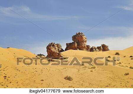 Hill almost fully covered with sand from a sand dune, route from Atar to Tidjikja, Adrar region, Mauritania, Africa View Large Photo Image Stock Photo - Hill almost fully covered with sand from a sand dune, route from Atar to Tidjikja, Adrar region, Mauritania, Africa. Fotosearch