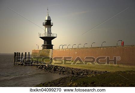 Historic Mole 1 lighthouse, Brunsbuttel, Schleswig-Holstein, Germany, Europe View Large Photo Image Stock Image - Historic Mole 1 lighthouse, Brunsbuttel, Schleswig-Holstein, Germany, Europe. Fotosearch