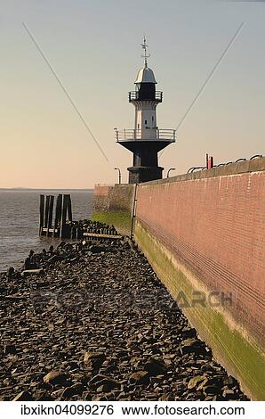 Historic Mole 1 lighthouse, Brunsbuttel, Schleswig-Holstein, Germany, Europe View Large Photo Image Stock Photograph - Historic Mole 1 lighthouse, Brunsbuttel, Schleswig-Holstein, Germany, Europe. Fotosearch