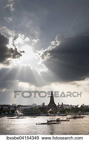 Hole in the clouds, royal barge procession on the Mae Nam Chao Phraya, Wat Arun, Temple of Dawn, Bangkok, Thailand, Asia View Large Photo Image Stock Photo - Hole in the clouds, royal barge procession on the Mae Nam Chao Phraya, Wat Arun, Temple of Dawn, Bangkok, Thailand, Asia. Fotosearch