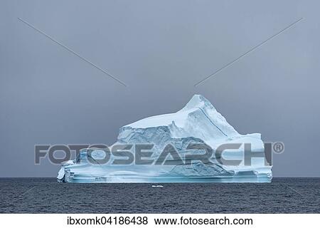Iceberg floating in the water, Scoresbysund, Eastern Greenland, Greenland, North America View Large Photo Image Stock Photo - Iceberg floating in the water, Scoresbysund, Eastern Greenland, Greenland, North America. Fotosearch