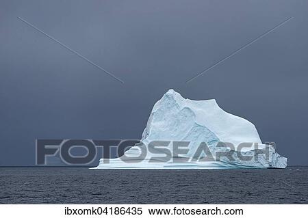 Iceberg floating in the water, Scoresbysund, Eastern Greenland, Greenland, North America View Large Photo Image Stock Photography - Iceberg floating in the water, Scoresbysund, Eastern Greenland, Greenland, North America. Fotosearch