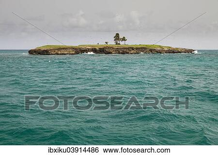 Stock Photograph - Ilet du Vieux Fort, bird island off Marie Galante, Guadeloupe, North America. Fotosearch