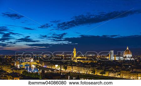Illuminated city panorama at dusk with Florence Cathedral, Duomo Santa Maria del Fiore with the dome by Brunelleschi, Palazzo Vecchio, Ponte Vecchio, UNESCO World Heritage Site, Florence, Tuscany, Italy, Europe View Large Photo Image Stock Image - Illuminated city panorama at dusk with Florence Cathedral, Duomo Santa Maria del Fiore with the dome by Brunelleschi, Palazzo Vecchio, Ponte Vecchio, UNESCO World Heritage Site, Florence, Tuscany, Italy, Europe. Fotosearch