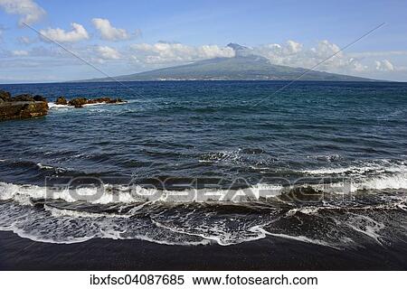 Stock Photography - Island with Mt Pico, beach, Praia do Almoxarife, Faial, Azores, Portugal, Europe. Fotosearch