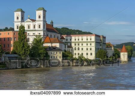 Jesuit Church of St. Michael, Schaiblingsturm tower, flooded promenade of the Inn river during high water, Innkai waterfront, historic centre, Passau, Lower Bavaria, Bavaria, Germany, Europe View Large Photo Image Stock Photo - Jesuit Church of St. Michael, Schaiblingsturm tower, flooded promenade of the Inn river during high water, Innkai waterfront, historic centre, Passau, Lower Bavaria, Bavaria, Germany, Europe. Fotosearch