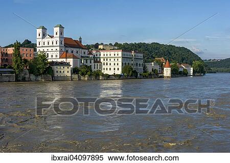 Jesuit Church of St. Michael, Schaiblingsturm tower, flooded promenade of the Inn river during high water, Innkai waterfront, historic centre, Passau, Lower Bavaria, Bavaria, Germany, Europe View Large Photo Image Stock Photography - Jesuit Church of St. Michael, Schaiblingsturm tower, flooded promenade of the Inn river during high water, Innkai waterfront, historic centre, Passau, Lower Bavaria, Bavaria, Germany, Europe. Fotosearch